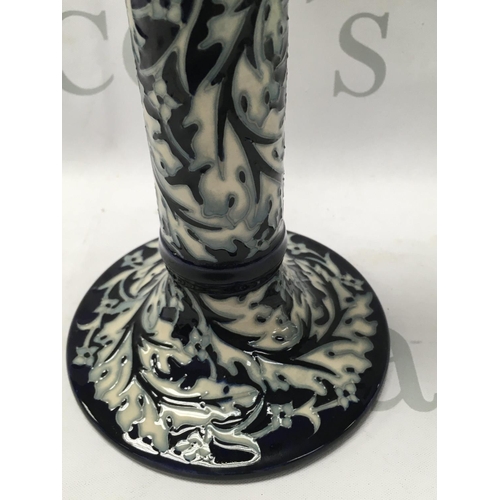 1006 - A Moorcroft trial candle stick .22 cm