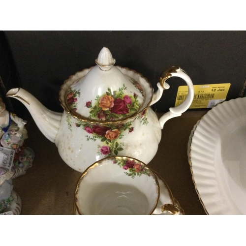 1030 - A part Royal Albert county rose tea set together with royal Albert white glazed dinner ware and a sm... 