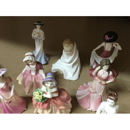 1069 - A collection of Royal Doulton porcelain figures