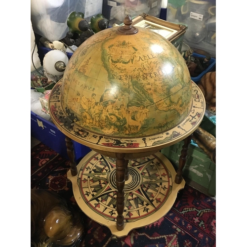 1337 - A vintage globe bar with glasses , approximately 90cm tall