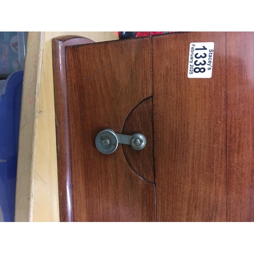 1338 - A Russian marine ships chronometer desk clock fitted in a mahogany brass Bound case .