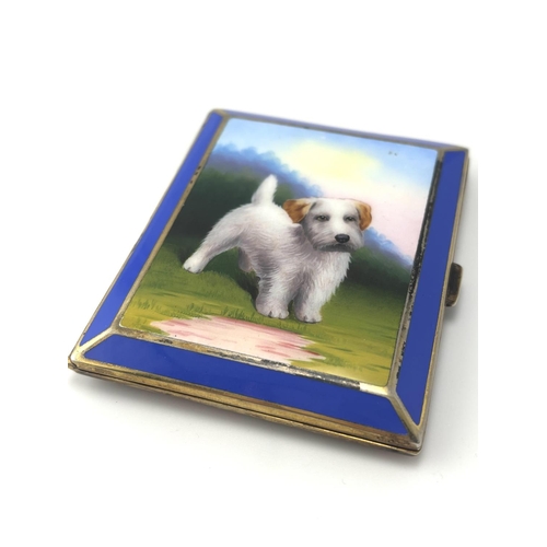 753 - A quality early 20th century enamel cigarette case with design of a Terrier dog. Postage category A