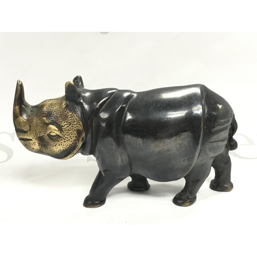 757 - Bronze Bull and Rhino figures , 10 & 14cm tall. Postage category B