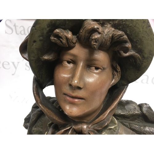 771 - A Victorian terracotta bust of a woman with bonnet , initials to back . 41cm tall. This lot cannot b... 