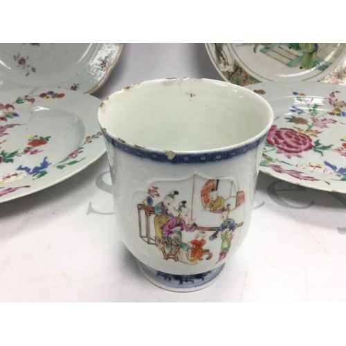 887 - Four famille rose plates, approx diameter 23cm and a mug decorated with figures in an interior scene... 