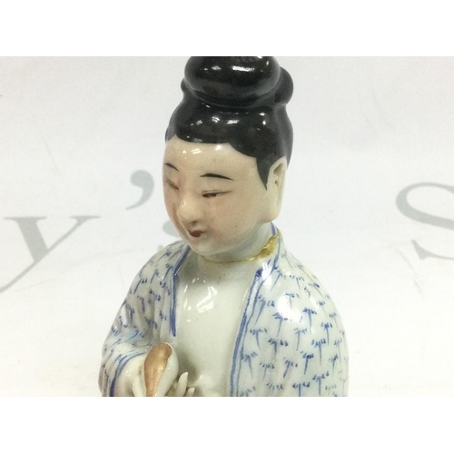 890 - A small circular box and cover plus an Oriental figure, approx 11.5cm a/f. Shipping category D.