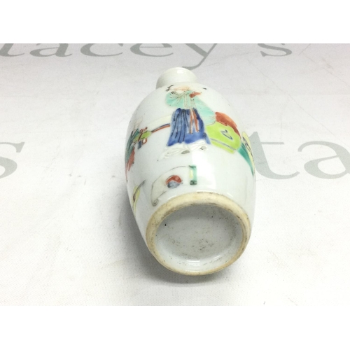 891 - A small bottle vase on stand and with handpainted decoration of figures, approx total height 14.5cm.... 