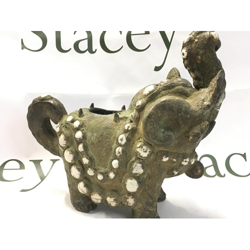 928 - An Asian elephant bronze censer , 19cm tall . Postage category B