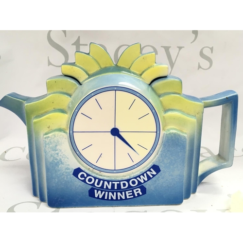 979 - A genuine porcelain Countdown winners teapot, Swineside Teapottery. 17cm tall 27cm wide. This lot ca... 