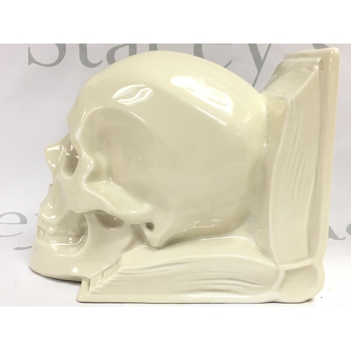 980 - A rare Hungarian Herend ceramic skull bookend, no obvious damage or restoration . This lot cannot be... 