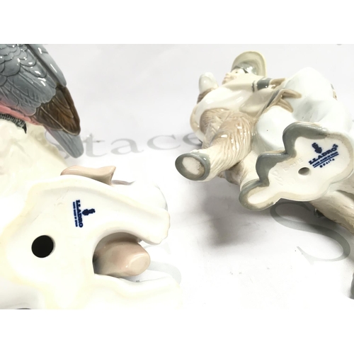 996 - Two Lladro figures and two Beswick bird figures , no obvious damage or restoration this lot cannot b... 