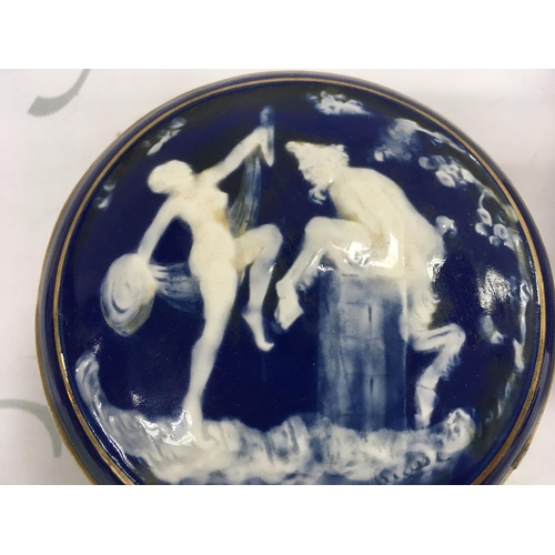 998 - Two Limoges porcelain blue and white art nouveau trinket boxes, one decorated with figures and the o... 