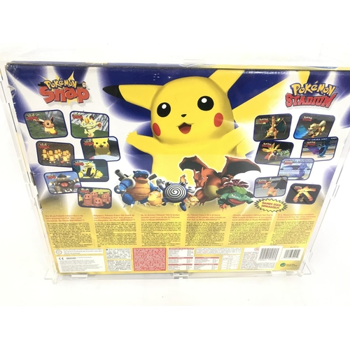 10 - A Boxed Nintendo 64 Pokemon Pikachu Version. In A Acrylic Case.