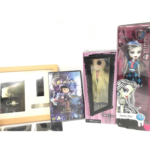 100 - A Collection of Boxed Coraline Figures. A Coraline Framed Film Cell. A Monster High Frankie Stein Do... 