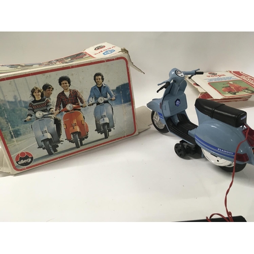 130 - A boxed Piaggio Vespa scooter battery operated. Box in poor condition.