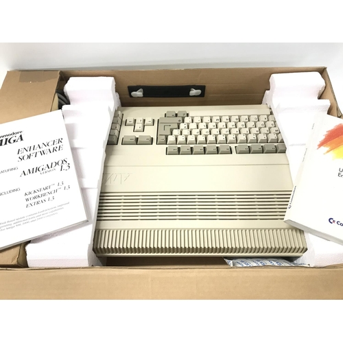 141 - A Boxed Commodore Amiga 500 with hard drive and Leads.. No Reserve. (2).