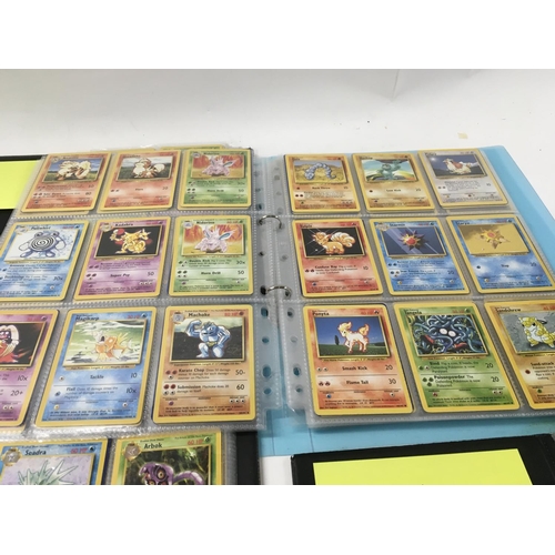 164 - A collection of 5 albums containing PokÃ©mon cards . album 1 contains Jungle Rocket.. album 2 contai... 