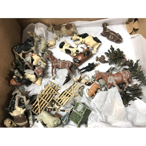 165 - A collection of assorted metal figures including cowboys and Indians farm yard animals etc. Postage ... 