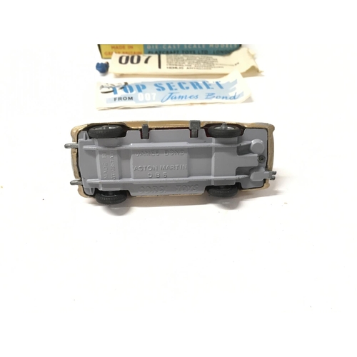 24 - A boxed 261 Corgi James Bond 007 gold coloured Aston Martin DB5. Includes 2x ejector passengers and ... 