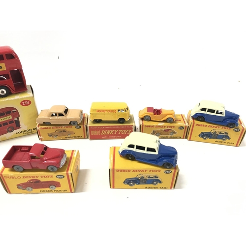 241 - A Collection of Boxed Dinky Toys including 2 X London Buses. 2 X Austin Taxis. A Morris Pick up. A F... 