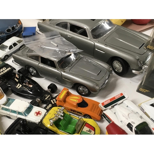 250 - A collection of Playworn diecast vehicles manufactured by Corgi..Matchbox etc. includes several Jame... 