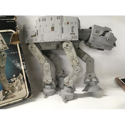 257 - Vintage Star Wars AT-AT in worn box. Has one chin gun.