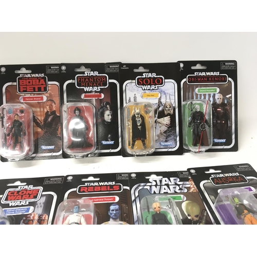 259 - A collection of Star Wars figures all in original unopened packaging.