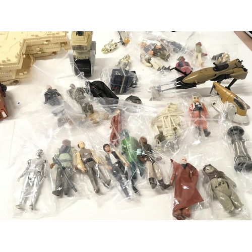 260 - A collection of Vintage Star Wars figures and parts.