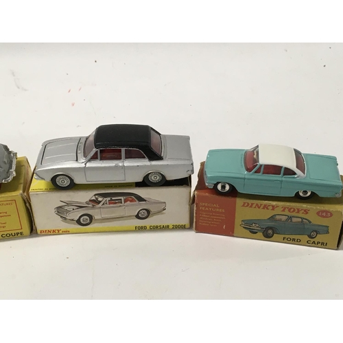 27 - A collection of of 5 boxed diecast model cars by Dinky includes No. 143 a Ford Capri.. No.165 a Ford... 