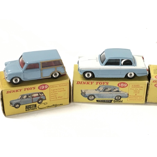 28 - A collection of 4 boxed diecast cars by Dinky includes..No138 a Hillman Imp Saloon..No146 a V8 Daiml... 