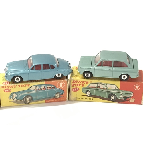 28 - A collection of 4 boxed diecast cars by Dinky includes..No138 a Hillman Imp Saloon..No146 a V8 Daiml... 