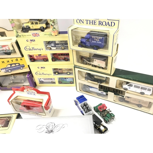 282 - A Small Collection of Boxed Diecast Including Lledo.Corgi. Matchbox Etc and a Brooke Bond History Of... 