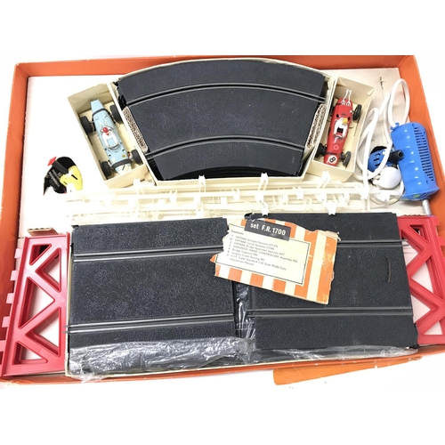 283 - A Boxed VIP High-Speed Electric Raceway Set. 4 X Boxed Cars. And Accessories including Scalextric.(2... 