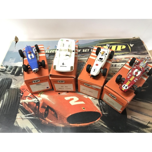 283 - A Boxed VIP High-Speed Electric Raceway Set. 4 X Boxed Cars. And Accessories including Scalextric.(2... 