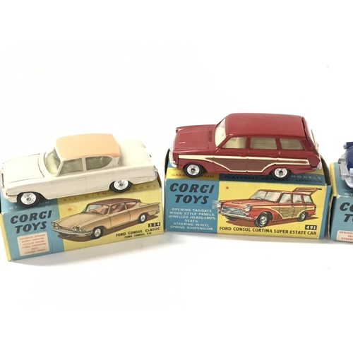 29 - A collection of 4 boxed diecast cars by Corgi includes No234 a Ford Consul Classic..No424 a Ford Zep... 