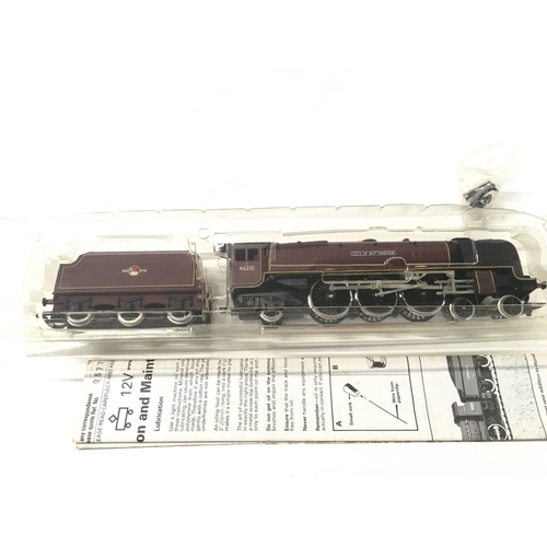 303 - A boxed 00 gauge model locomotive with tender by Hornby R.577. BR 4.6.2 Coronation Class. City of No... 