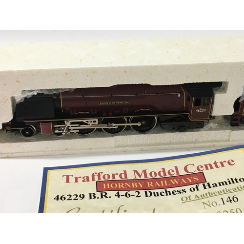 306 - A boxed 00 gauge model locomotive with tender by Hornby TMC3. Princess Coronation Class. BR No.46229... 