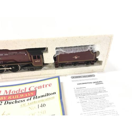 306 - A boxed 00 gauge model locomotive with tender by Hornby TMC3. Princess Coronation Class. BR No.46229... 