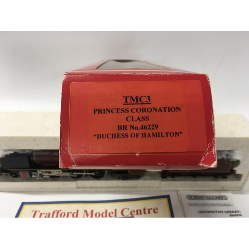 306 - A boxed 00 gauge model locomotive with tender by Hornby TMC3. Princess Coronation Class. BR No.46229... 