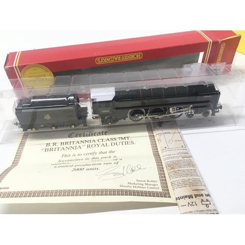 318 - 2x boxed 00 gauge model locomotives by Hornby including R.2200. BR 2.10.0. Class 9 F loco weathered ... 