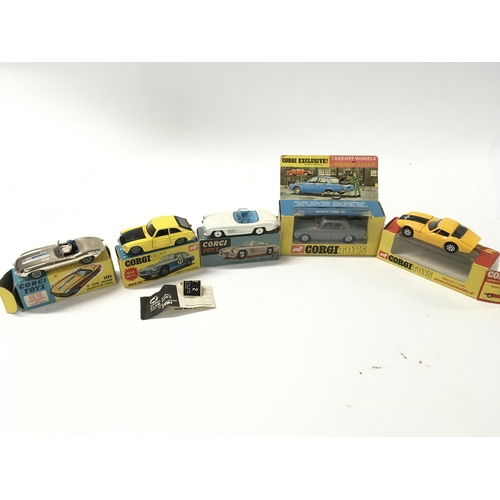 33 - A collection of 5 boxed diecast model cars by Corgi includes No275 a Rover 2000TC..No303 a Mercedes ... 