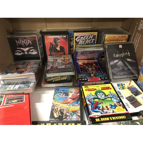 336 - A collection in excess of 30 boxed games for Commodore 64.