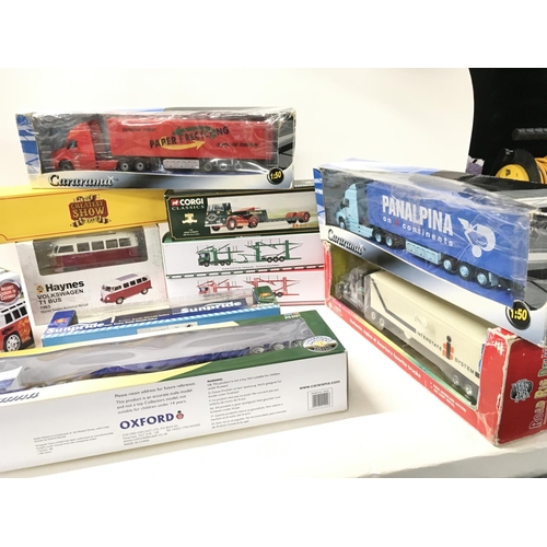 345 - An assorted collection of 14 model vehicles both collectibles and fun . Includes a remote control VW... 