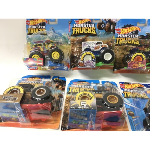 347 - A collection of 12 unopened Hot Wheels Monster Trucks 1:64 scale. Includes Bone Shaker ..Milk Monste... 