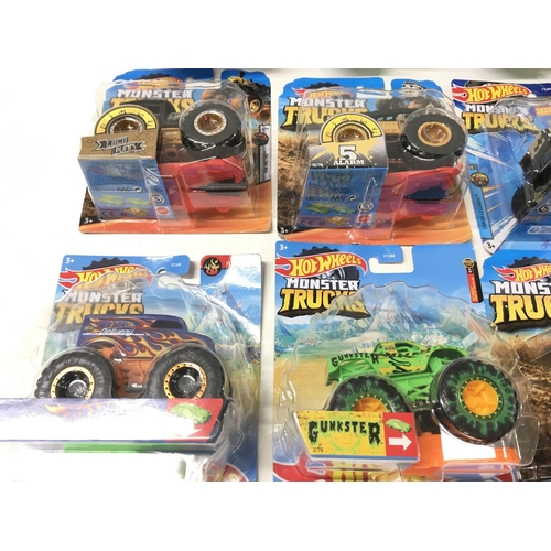 347 - A collection of 12 unopened Hot Wheels Monster Trucks 1:64 scale. Includes Bone Shaker ..Milk Monste... 