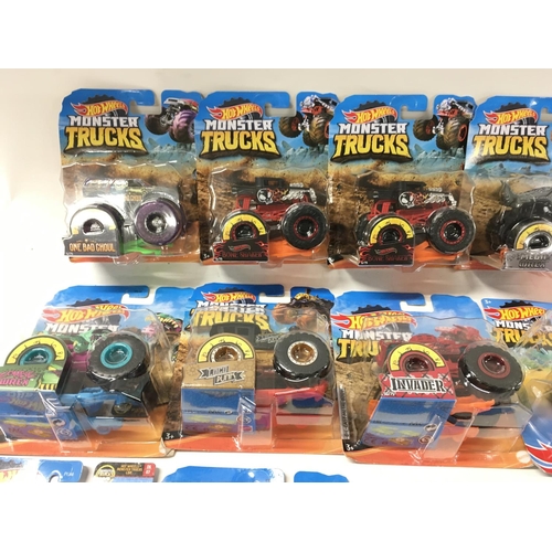 348 - A collection of 12 Hot Wheels Monster Trucks 1:64 scale. Includes All Fried Up..Zombie Wrex..plus ot... 