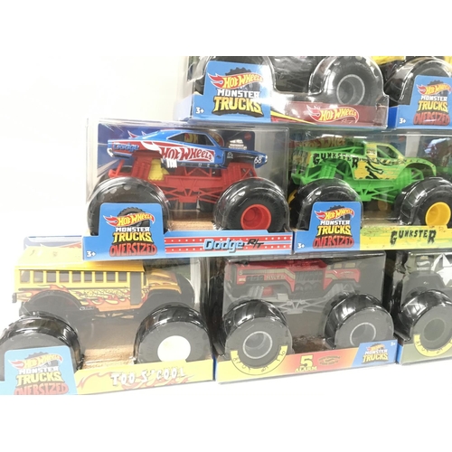 350 - A collection of 9 Hot Wheels Monster Trucks 1:24 scale..includes Gunkster..Too School..plus others n... 