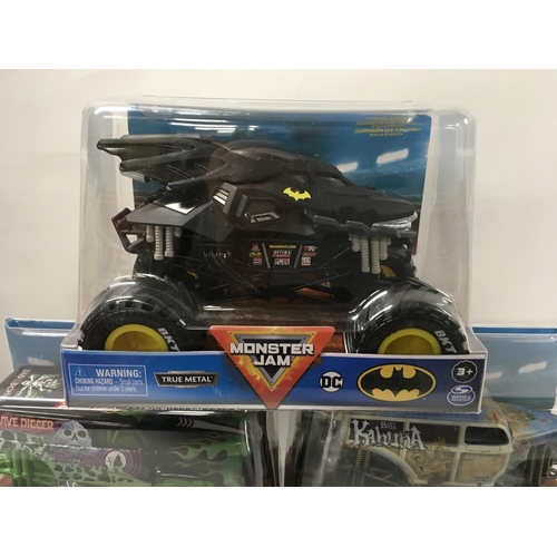 358 - A collection of 5 unopened Monster Jam monster trucks 1:24 scale. Includes Batman..Grave Digger and ... 