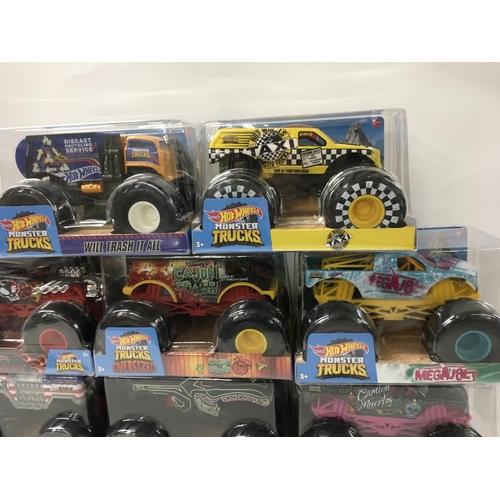 359 - A collection of 8 unopened Hot Wheels Monster Trucks 1:24 scale. Includes Cajun Crash..Bone Shaker p... 