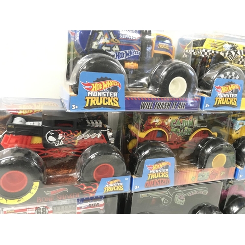 359 - A collection of 8 unopened Hot Wheels Monster Trucks 1:24 scale. Includes Cajun Crash..Bone Shaker p... 